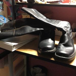 Black upper leather boots.